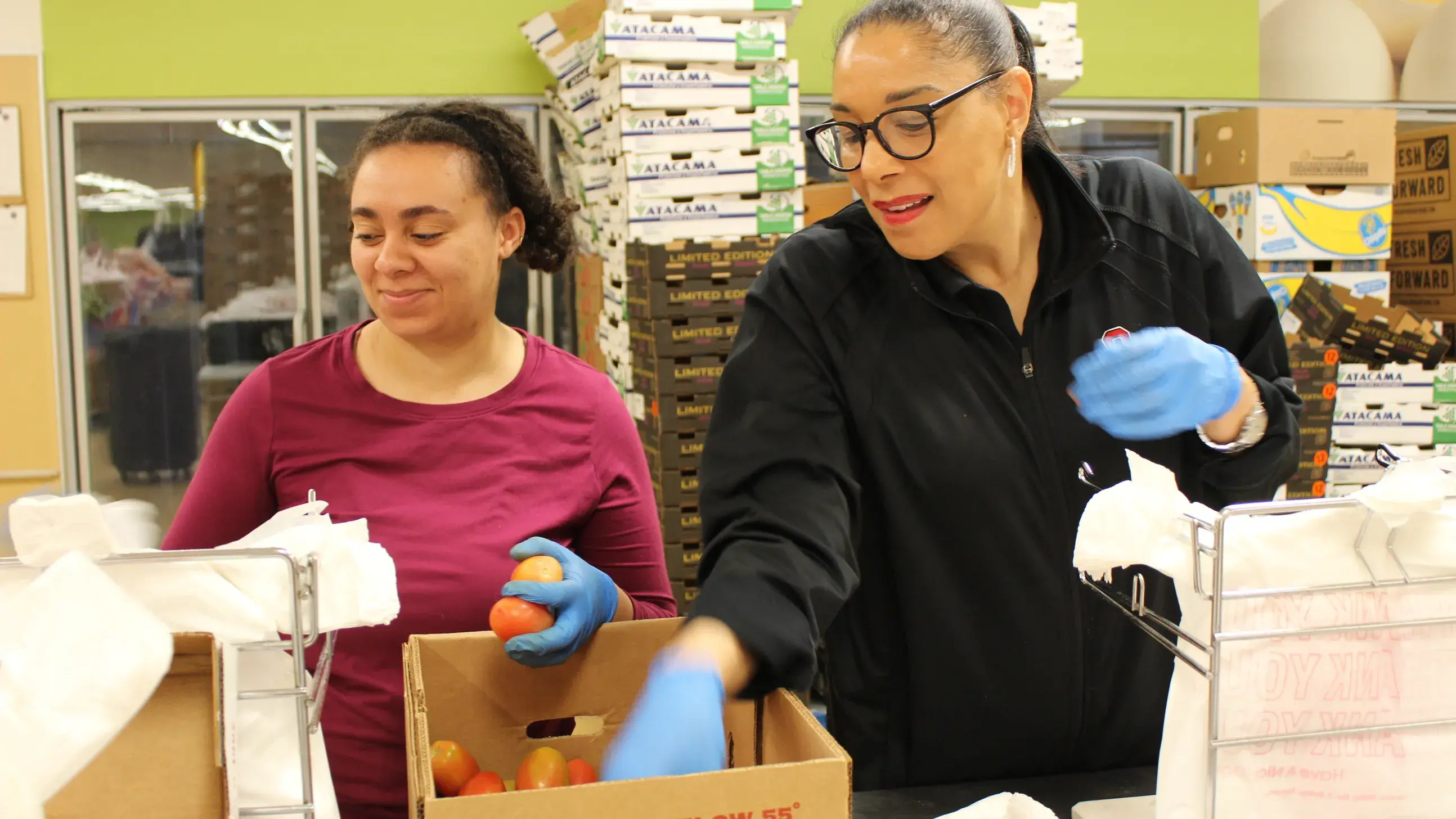 he Kirwan team helping Mid-Ohio food bank prepare for a day of shoppers as part of their quarterly team-building work